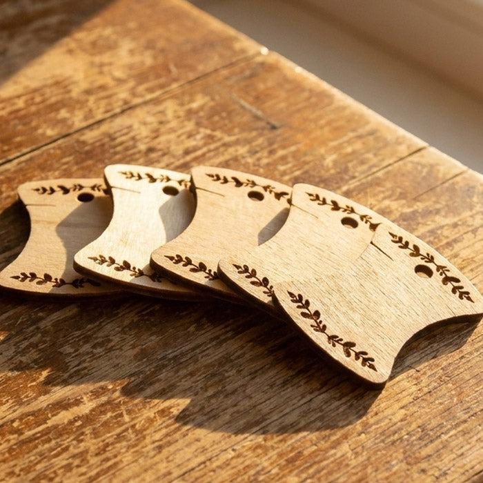 Bobbiner til broderigarn i tre (5 stk)