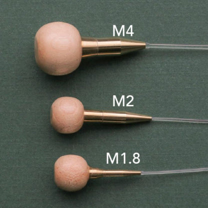 SeeKnit stoppers i tre